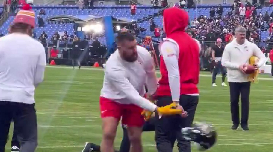 Travis Kelce Throws Helmet