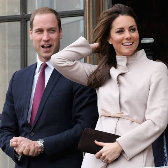 Princess Kate and Prince William celebrating the news of a new addition to the Royal Family, arriving soon.