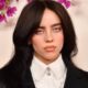 Billie Eilish stuns fans with a daring selfie, fueling speculation after being spotted with a mystery blonde.